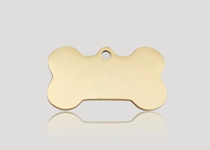 Polished gold bone-shaped stainless steel pet ID tag with a smooth reflective finish
