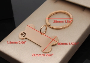 Rose gold bone-shaped pet ID tag dimensions showing 40mm length and paw print detail