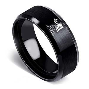 Detail of 8mm black stainless steel ring featuring Virgo zodiac sign with brushed finish