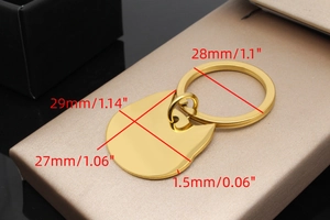 Detailed view of golden cat-shaped metal pet tag with specific size measurements