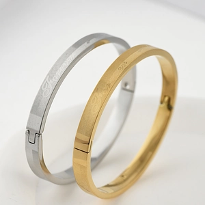 Detail of titanium steel bracelets with forever engraving and brushed texture finish