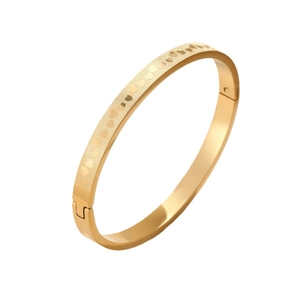 Gold plated stainless steel hinged bangle with etched heart patterns and matte finish