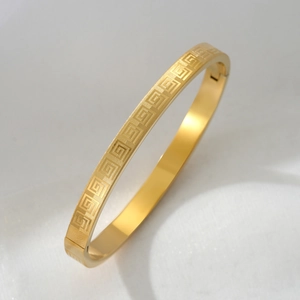 Titanium steel gold bracelet with elegant Greek meander pattern and clasp closure