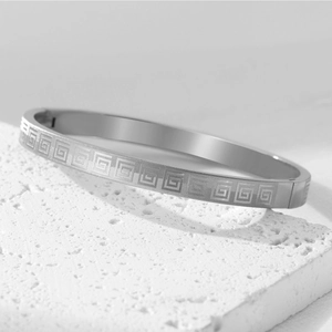 Silver stainless steel bracelet with Greek meander pattern and snap closure