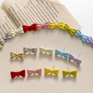 Colorful resin bow stud earrings set with golden needles for DIY jewelry making