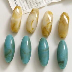Perline ovali in acrilico effetto marmo per gioielli fai da te in toni beige e verde acqua