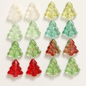 Detailed view of colorful 3D glass Christmas tree beads with gold glitter for DIY jewelry