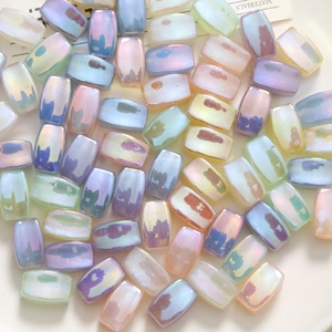 Macro shot of rectangular pearlescent resin beads with iridescent shimmer for DIY crafts