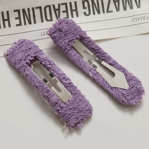 Detail of purple lace crochet hair clips with vintage square metal BB clip structure