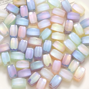 Close-up of rectangular iridescent beads in pastel colors for DIY jewelry making