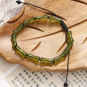 Bracciale retrò in perle di bambù verde stile orientale con corda intrecciata nera regolabile