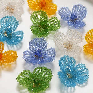 Macro detail of handmade colorful faceted crystal bead flower accessories for DIY jewelry