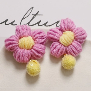 Handmade knitted pink and yellow floral earrings with sparkling sequin ball pendants