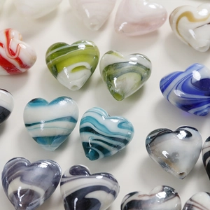 Handmade heart-shaped glass beads with marble texture and central hole for DIY jewelry