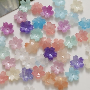 Macro shot of 12mm colorful cherry blossom acrylic flower beads for DIY jewelry making