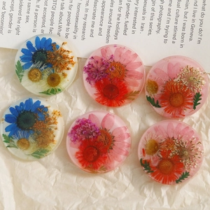 Handmade clear resin round charms with real dried sunflowers and daisies for DIY crafts