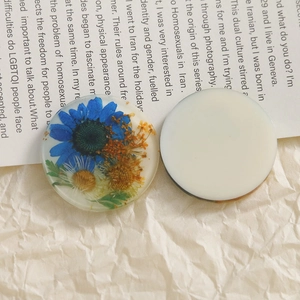 Round handmade resin sunflower pendant with dried blue flowers for DIY jewelry making