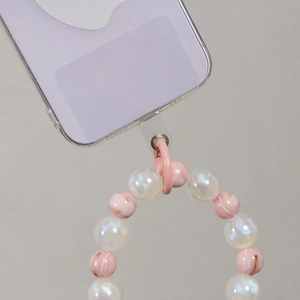 Pink and pearlescent white beaded phone lanyard wrist strap with clear security patch