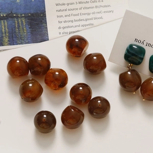 Amber resin beads for DIY jewelry making with a polished translucent finish