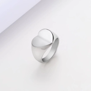 Polished silver heart signet ring in minimalist stainless steel with a glossy finish