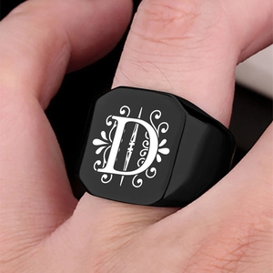 Men's vintage black stainless steel signet ring with engraved letter D and scrolls