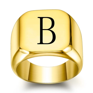 Polished gold signet ring for men featuring a square face and black letter B engraving