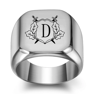 Detail of square signet ring with engraved heraldic crest and alphabet letter D