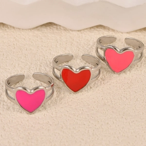 Three-piece set of silver heart open rings with red and pink enamel in minimalist style