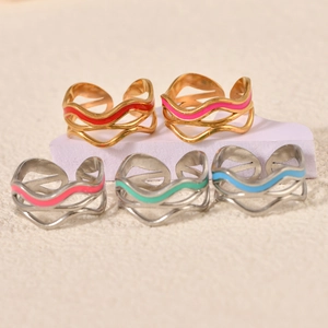 Set of five wavy enamel open rings in gold and silver finish with vibrant drip oil colors
