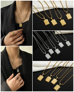 Detail of square gold alphabet pendant with radial texture and durable box chain necklace