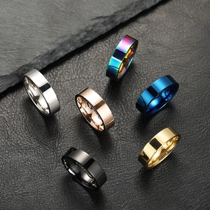 Polished stainless steel band rings in silver, gold, rose gold, black, blue and rainbow