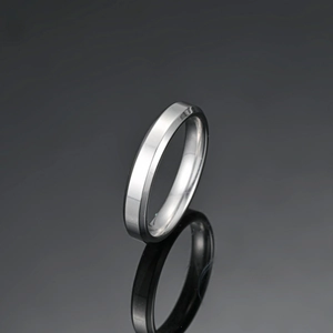 Close-up of beveled edge ring showing brushed metal texture and polished finish contrast