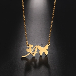 Detail of golden stainless steel necklace with letter A, heart and butterfly pendant