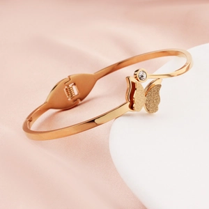 Elegant rose gold butterfly spring bangle with sparkling zircon in stainless steel