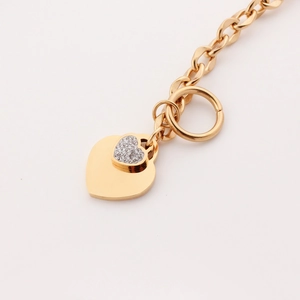 Bracelet cœur chic en acier inoxydable doré avec zircons brillants et fermoir à bascule OT