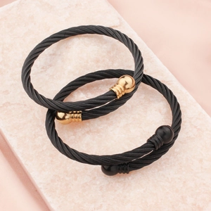 Adjustable stainless steel cable wire cuff bracelet with gold and black ball ends