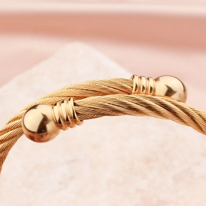Adjustable gold stainless steel cable wire cuff bracelet with polished bead ends