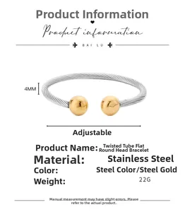 Detailed view of 4mm twisted steel rope bracelet with golden spheres and size specifications