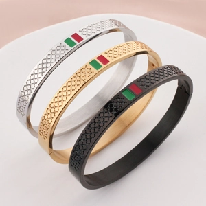 Polished titanium steel bangle set with green and red enamel stripe in three colors