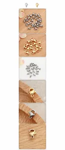 Detailed view of polished stainless steel lobster clasps in gold and silver for jewelry