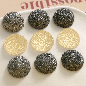 Sparkling black and silver resin beads in a 3x3 grid for DIY jewelry and crafts