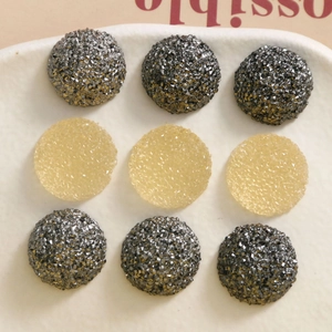 Spherical resin DIY charms with sugar-grain texture for jewelry in dark grey and amber