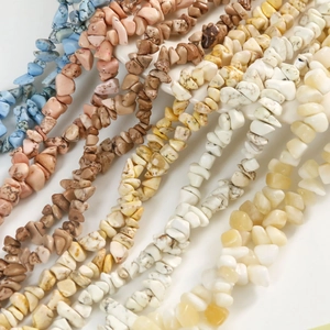 Macro view of assorted irregular natural stone beads for DIY jewelry and bracelet making