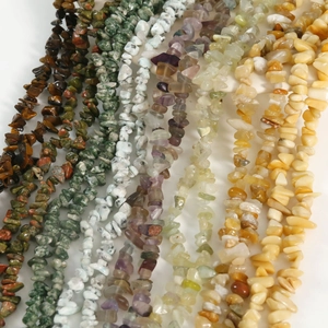 Assorted natural crushed stone beads including tiger eye and moss agate for DIY jewelry