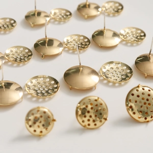 Detailed view of gold plated multi-hole earring bases for DIY jewelry making