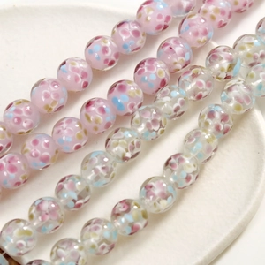 Cuentas de vidrio con patrón floral pastel para joyería DIY con acabado redondo pulido