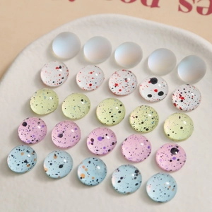 Set of 10mm round glass cabochons with colorful ink splatter effect for DIY jewelry crafts