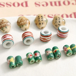 Detailed view of assorted retro hand-painted ceramic beads for DIY jewelry making