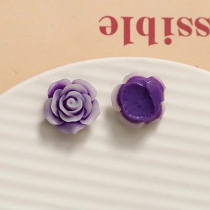Detailed macro view of resin rose petals with gradient purple tones for DIY jewelry