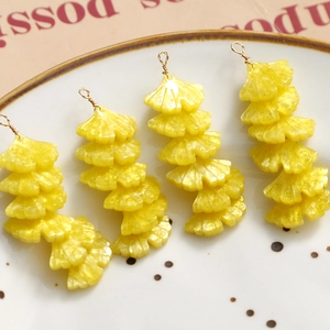 Handmade yellow resin ginkgo leaf pendants with glitter and golden wire rings